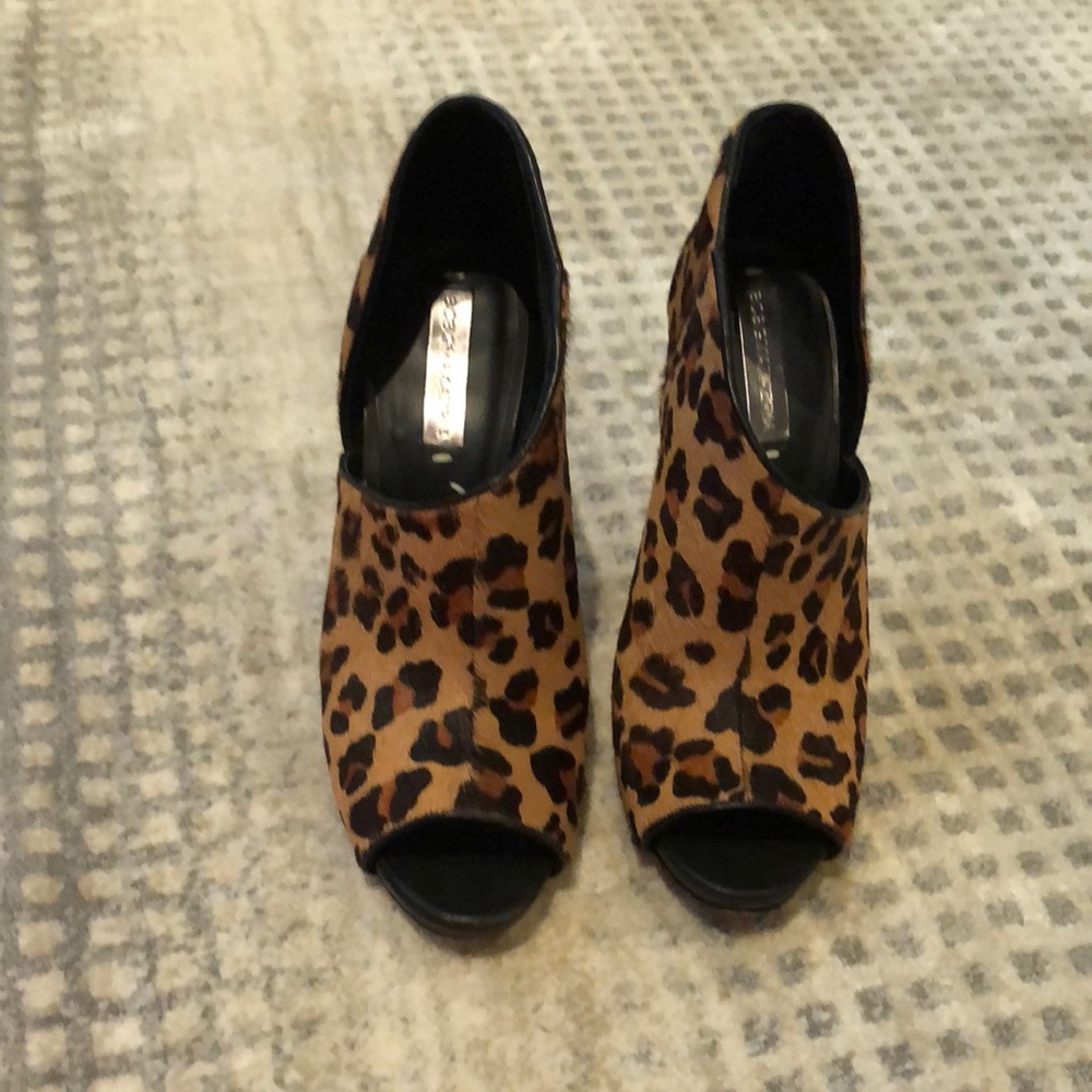 Size 8 peep toe cheetah heels with an open side